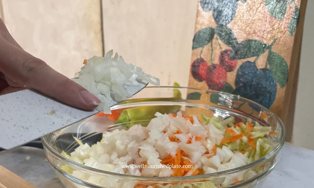 zucchini and carrot fritters in a bowl