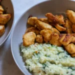 Creamy rice served with chicken