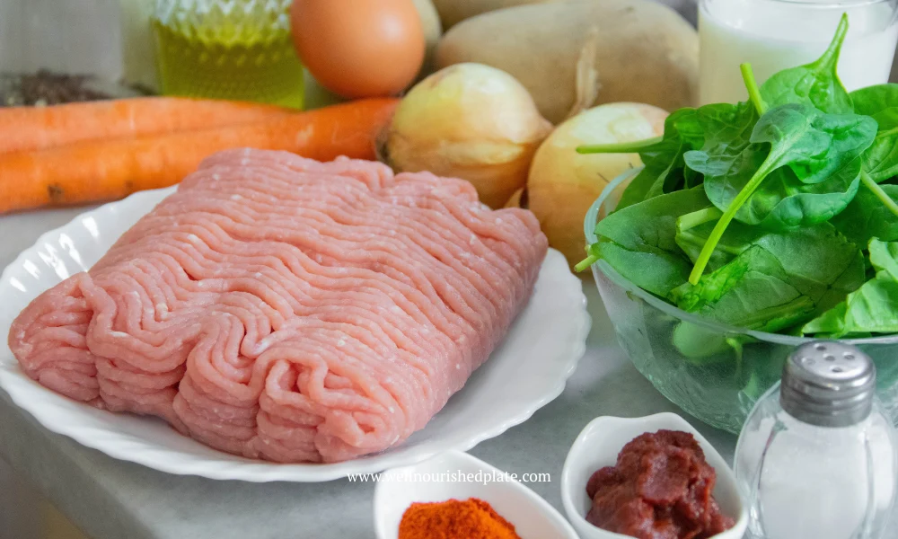 serbian moussaka ingredients: ground meat, carrots, onion, potatoes