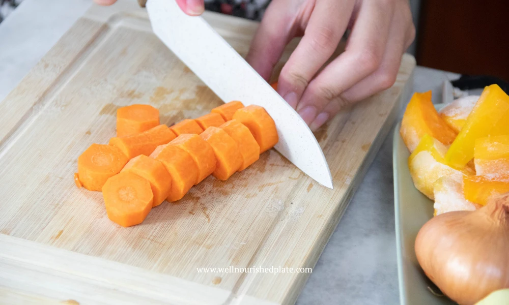 cutting the carrot for butternut soup