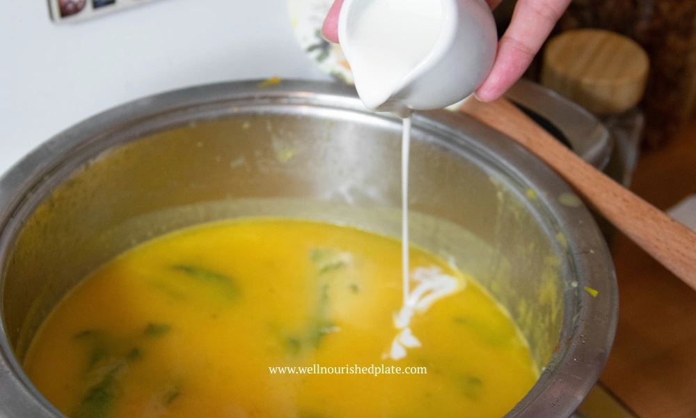 adding soy cream to vegan soup