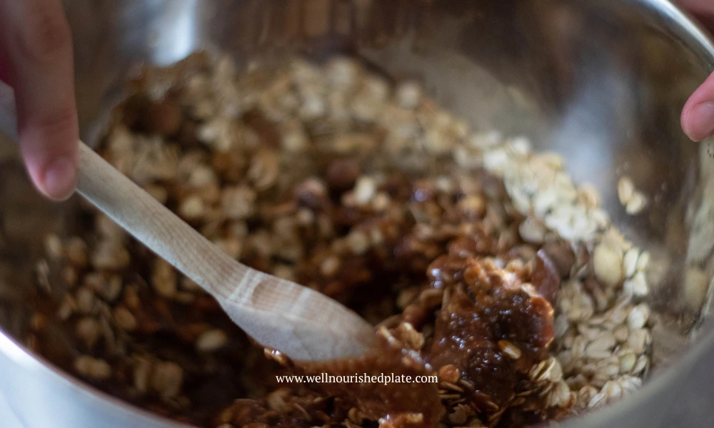 mixing gluten free apple cinnamon granola together