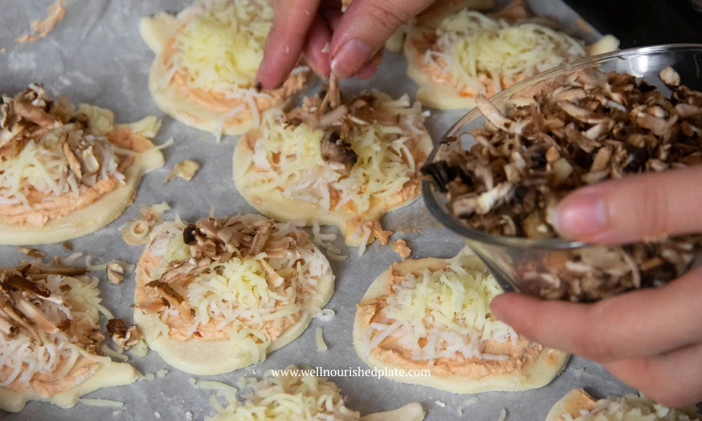 mini pizzas on a baking tray